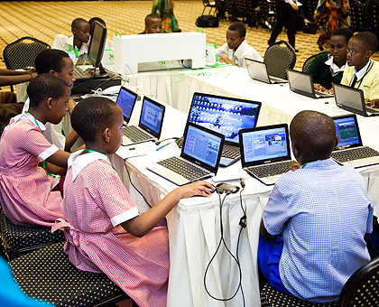 Pupils from several local schools developing the scratch software they use to create their own computer games. The New Times / Timothy Kisambira.