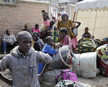 Refugees from Congo await a truck in Rubavu to transport them to Nkamira Transit camp. The New Times / Timothy Kisambira.