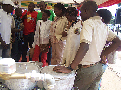 An exhibitor showcases energy saving stoves. The New Times / JP Bucyensenge.