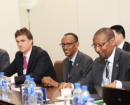 President Kagame at the meeting yesterday. Right is Finance minister John Rwangombwa. The New Times / Village Urugwiro.