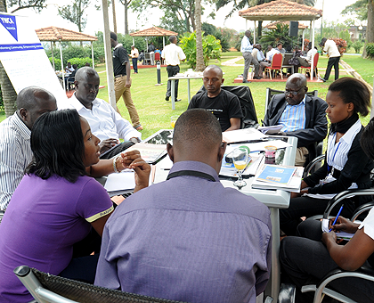 Members of the Civil Society discussing with journalists during the media breakfast yesterday. The New Times / J. Mbanda.