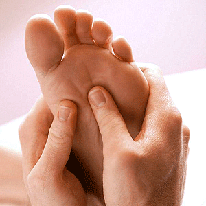 A reflexologist treating a patient. The demand for reflexology is on the rise. The New Times / Net Photo.