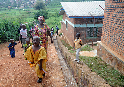 The last of children are taken by foster parents and family members from a Kigali based orphanage before it was closed recently. Government plans to phase out all orphanages. The New Times / File.