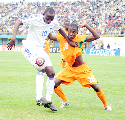 Striker Andrew Buteera's (L) move from Proline to APR appear to be far from completed after the Ugandan club asked for US$50,000 in transfer fee. The New Times/File.