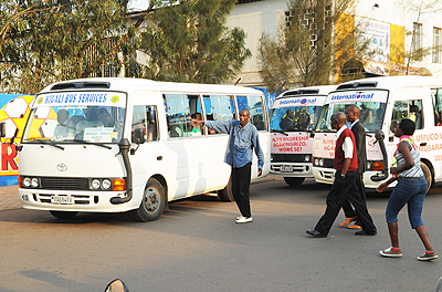 A taxi broker calling out to passengers