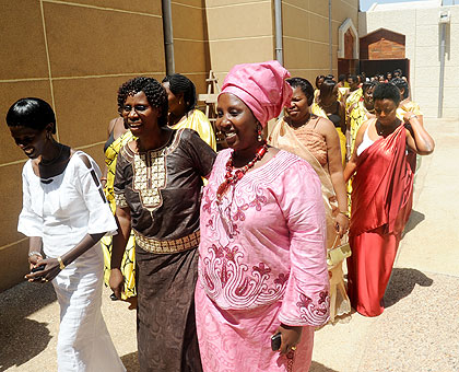 Women take a break from the meeting during the General assembly at Parliament Saturday. The New Times / John Mbanda.