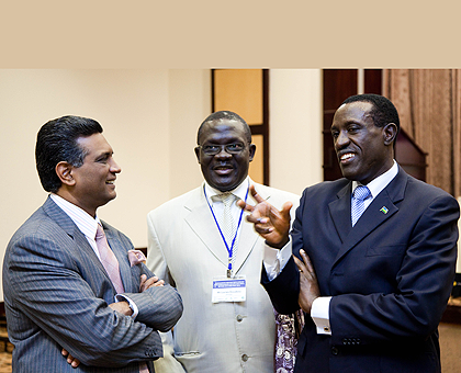 (L-R) Mauritian Health Minister, Lormus Bundhoo(L) Lucien Kouakou of IPPFAR, and Senate president, Dr Jean Damascene Ntawukuriryayo, chatting during the meeting yesterday. The New Times / Timothy Kisambira.