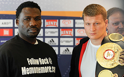 Alexander Povetkin (R) defends his title on Saturday against former heavyweight champions Hasim Rahman (L). Net photo.