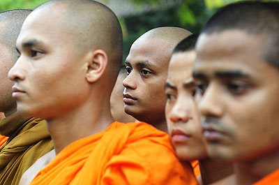 Bangladeshi Buddhist monks stage a protest in Chittagong, Bangladesh, on September 30, 2012 after Muslims torched Buddhist temples in southern Bangladesh. AP photo.