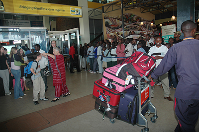 Passengers at Kigali International Airport. The service sector including transport and tourism industries boosted economic growth in the second quarter of this year.  The New Times / File.