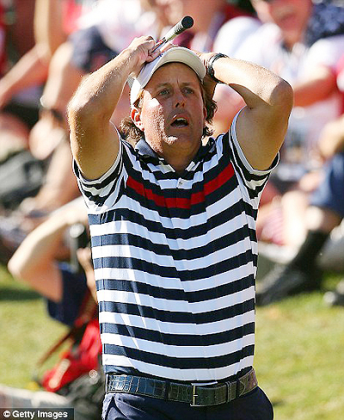 Phil Mickelson puts his hands on his head in disbelief. Net photo.