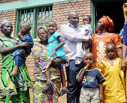 Foster Parents take children out of an orphanage which was closed recently. The Sunday Times/File.