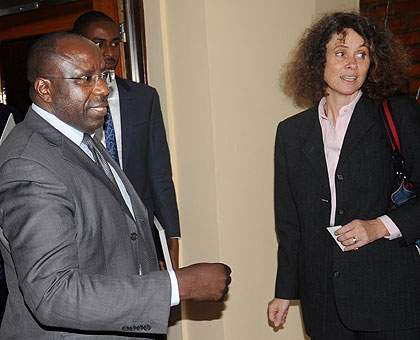 Prime Minister Pierre Damien Habumuremyi (L) with World Bank country representative Carolyn Turk after meeting yesterday. The New Times / John Mbanda.