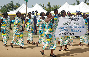 Women denounce domestic violence at a past awareness campaign. The New Times / File.