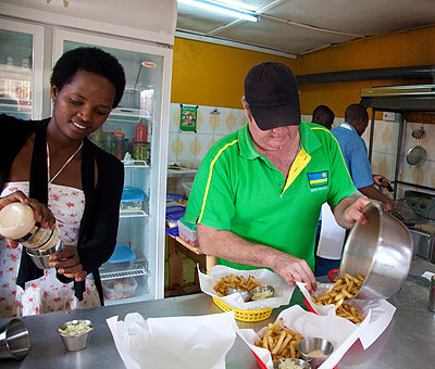 Paul Searby helping out in his Kimihurura restaurant 