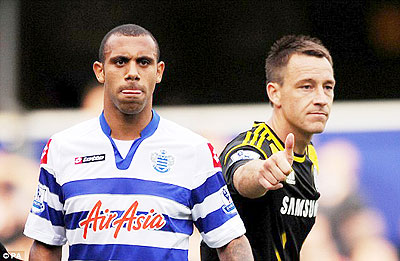 Terry was banned for racially abusing Anton Ferdinand (left). Net photo.