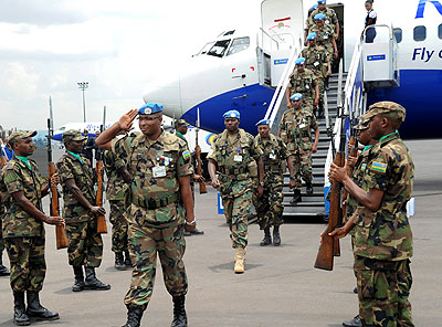 RDF soldiers return from a UN peace keeping mission  black.