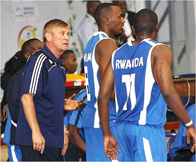 Nenad Amanovic (left) talking to his players during the Afro-basket junior championship in Maputo. The New Times / File.