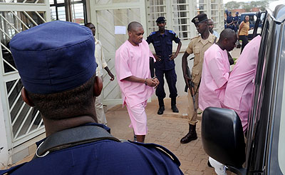 Ingabire co-accused leave court amid tight security yesterday. Neither Ingabire nor any of her lawyers showed up. The New Times / John Mbanda.