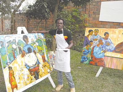 Innocent Buregeya with his artworks. 