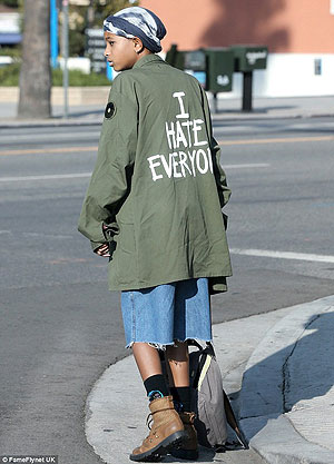 We've all been there. Willow Smith shows first signs of puberty as she steps out in 'I hate everyone' jacket. Net photo.