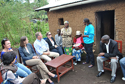 The CEO of IKEA Foundation Per Heggenes and his delegation listen to a resident in Musanze district.  The New Times / Sam Nkurunziza.