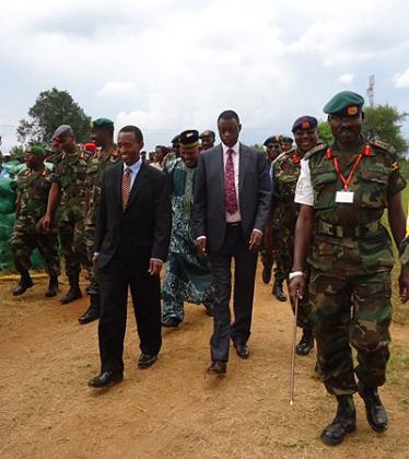 L-R Tanzanian Defence Minister Shamsi Vuai Nahodha, Defence Minister James Kabarebe and UPDF Contingent Commander, Brigadier General Nakibus Lakara at the closing ceremony yesterday. The New Times / Courtesy.