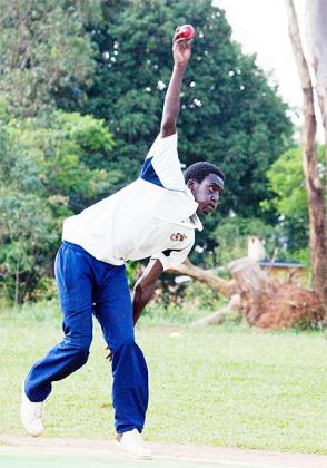 Kagarama SS bowler Tito Gakire in action during the final against Remera Giporoso on Sunday.  The New Times / T. Kisambira.