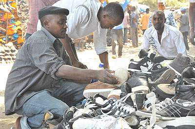 A trader sells shoes at Gikomba market in Nairobi, capital of Kenya. Small and medium traders can now afford open source softwares which enable them perform business processes like accounti