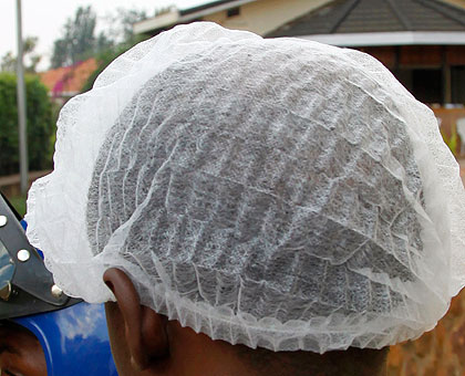 Use of the head gear remains a challenge despite the health benefits.  The New Times / File.