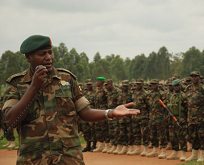 An officer with Uganda's UPDF briefs a contigent serving under AMISOM. The Ugandans have threatened to pull out of the mission. Net Photo.