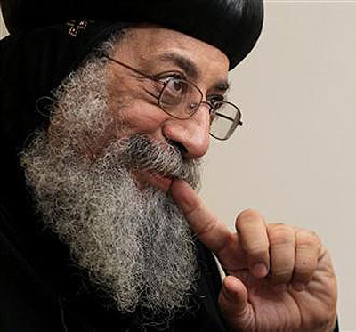 Pope Tawadros II, the newly-selected 118th pope of Egypts Coptic Orthodox Church, smiles during an interview at the Wadi Natrun Monastery complex. Net photo