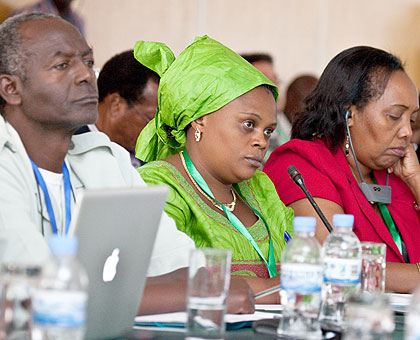 Participants listen to a presentation during the conference that has attracted continental scholars. The New Times / T. Kisambira.