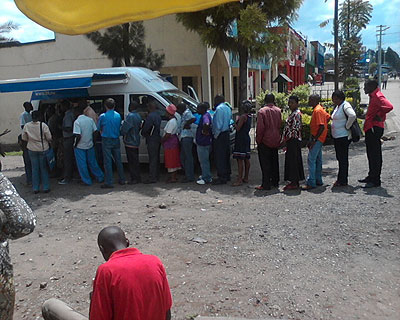 Customers seek service at one of BKu2019s mobile banks. Courtesy / photo.