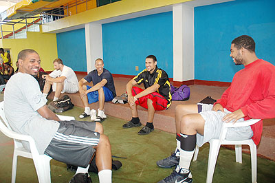 Rwandau2019s American players share a joke shortly after training at Amahoro Stadium, 2009. The NewTimes/File.