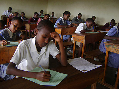 Pupils seating for an exam. The New Times / File.