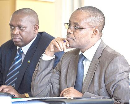 Protais Murayire (R) Mayor of Kirehe District, together with Marie Vianney Makombe, the Provinceu2019s executive secretary, meeting Parliamentu2019s Public Accounts Committee (PAC) on Tuesday. PAC took to task Eastern Province accounts managers to explain the whereabouts of the missing 1678 text books donated by the Adventist Development and Relief Agency (ADRA).