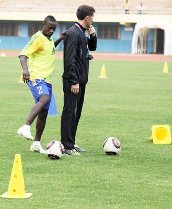 Micho (right) is seeking to guide Amavubi to a second Cecafa title but will have to do it without key defender Mbuyu Twite (left), who snubbed the national call. The New Times/T. Kisambira.