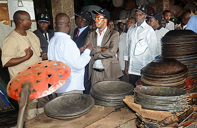 Governemnt officials inspecting Gacingiro in Kigali. The area is a workplace for many entreprenurs in Kigali city, mainly carpenters. The New Times / File.