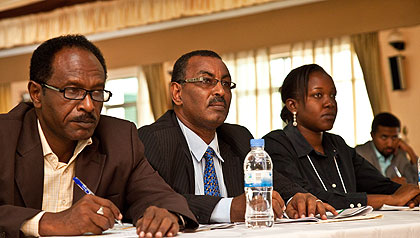 Participants during the Global meeting discuss drug supply chain. The New Times / T.Kisambira.