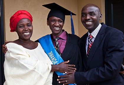 Ziade Rugirama (C) being congratulated by his Aunt Marthe Mukamusoni (L) and Innocent Ntagwabira his mentor. The New Times / T.Kisambira.