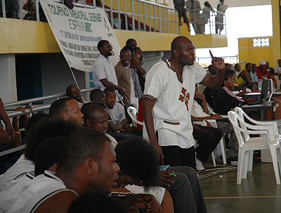 Cliff Owuor in action coaching APR Basket Club. The New Times / File.