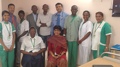 L-R,  Sr. Epiphanie Mukarabanga and Dr. S. Narayani. Standing the Rwandan patients and the respective nursing teams from Mumbai and Rwamagana are Dr. Haresh Dodeja (4th ) and Clarence Fernandes (2nd from left). The New Times / File.