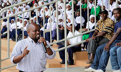 Minister of Youth and ICT,  Jean Philbert Nsengimana, addressing students in a previous meeting. A youth forum next month will bring together 3000. The New Times / File.