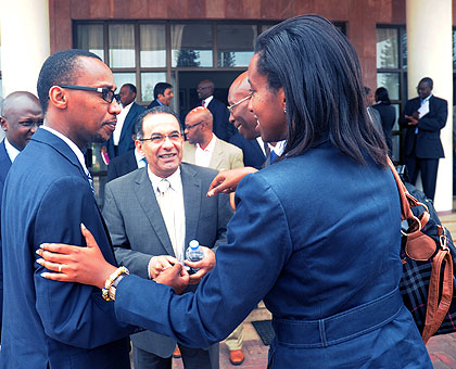 Head of Tourism at RDB Rica Rwigamba (R) chats with RURA boss Regis Gatarayiha as MTN CEO Khaled Mikkawii (C) looks on after the meeting on Service delivery yesterday. The New Times / J Mbanda.