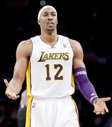 Dwight Howard of the Los Angeles Lakers reacts to his offensive foul during a 113-103 loss to the Orlando Magic. Net photo.