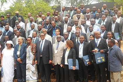 Some of the scholars attending the conference pose for a group photo. The New Times / J.P. Bucyensenge.