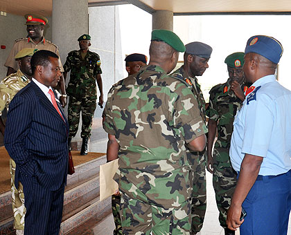 The officers sharing a light moment after their meeting at the RDF headquarters yesterday.  The New Times / Courtesy.