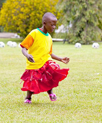 A girl was dances for the First Lady Jeannette Kagame