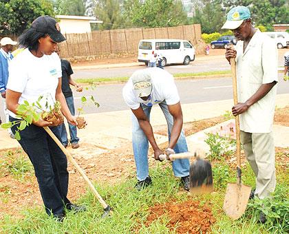 Integrated Rwandans during the tree planting exercise in Kigali, yesterday. The Sunday Times/Sam K. Nkurunziza.